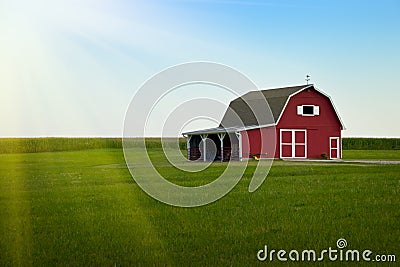 Amish Farm - Red barn and Green Field Sunrise Stock Photo