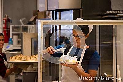 Amish woman making lemon meringue pie Editorial Stock Photo