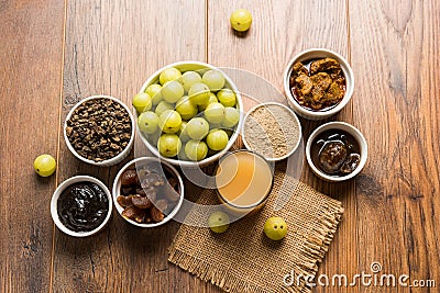 Amla or avla juice, pickle, supari, murabba, chyawanprash Stock Photo