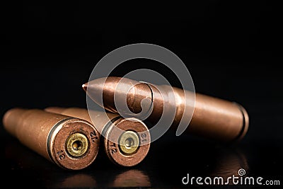 Ammunition of a high-speed rifle. Cartridges for a military rifle Stock Photo