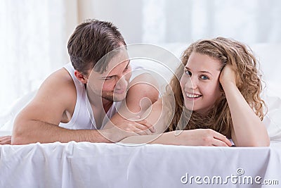 Amorous couple in the bedroom Stock Photo