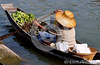 Amphawa, Thailand: Woman Paddling Boat Editorial Stock Photo