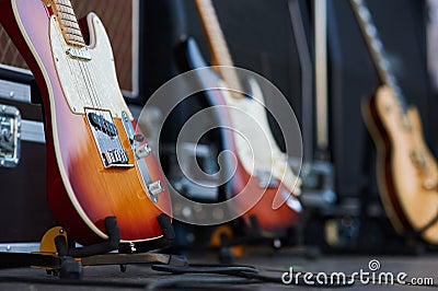 Amplifier with electric guitar on the stage. music instrument set for guitarist. no people Stock Photo