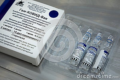 Ampoules with the Gam-COVID-Vac Sputnik V trademark Editorial Stock Photo