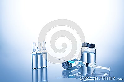 Ampoules, vials, syringe. Medical injection,diseases,health care,diabetes,insulin. Syringe with liquid vaccines Stock Photo