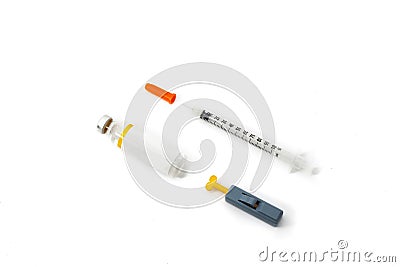 Ampule, syringe and finger prick. Stock Photo