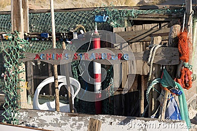 Beach Huts and other Objects out of Flotsam and Jetsam Editorial Stock Photo