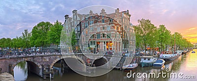 Amstel river, canals and night view of beautiful Amsterdam city. Netherlands Stock Photo