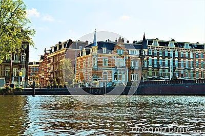 Amsterdam, Amstel river, Netherlands, Europe and colorful buildings Stock Photo