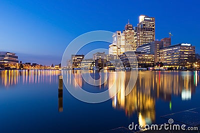 Amsterdam blue hour skyline with office buildings Stock Photo