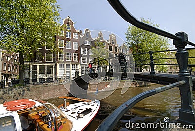 Amsterdam canal with boat Stock Photo