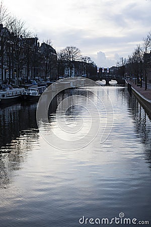 Amsterdam canal at dusk Stock Photo