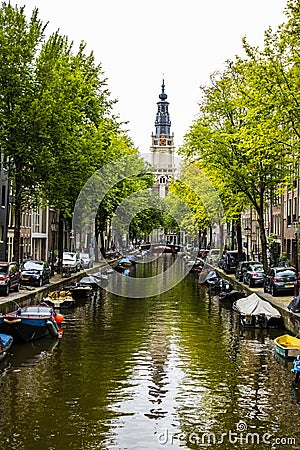 Amsterdam canal moored boats Editorial Stock Photo