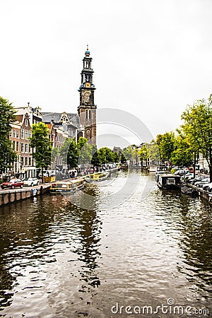 Amsterdam canal moored boats Editorial Stock Photo