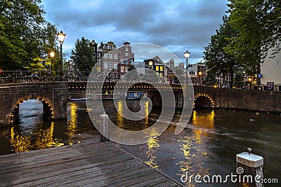 Amsterdam Canal At Night Editorial Stock Photo