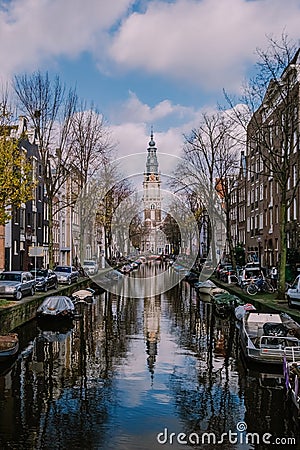 Amsterdam canal with view at the Zuiderkerk Amsterdam church canalside Netherlands Editorial Stock Photo