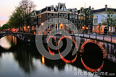 Amsterdam canals at dusk Stock Photo