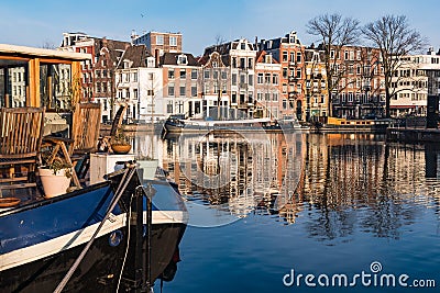 The reflections of Amsterdam and a houseboat Stock Photo