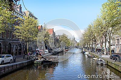 Amsterdam channels, historical places of Amsterdam, beautiful houses along the river Editorial Stock Photo