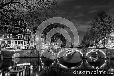 Typies amsterdam, a great city with lots of water, old buildings and colors Editorial Stock Photo