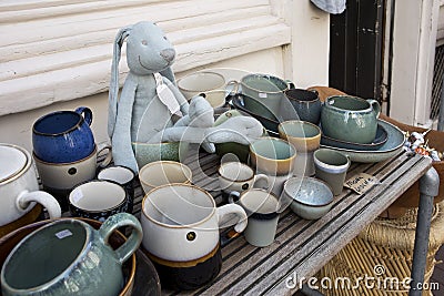 Ceramic tableware in the shop window Editorial Stock Photo