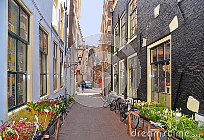 Amsterdam, Holland. Cityscape with with narrow street and facade of old buildings in historical centre of Duch capital, Stock Photo