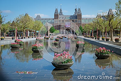 Amsterdam Netherlands April 2020, almost empty Amsterdam Rijksmuseum square during the corona covid 19 outbreak virus in Editorial Stock Photo