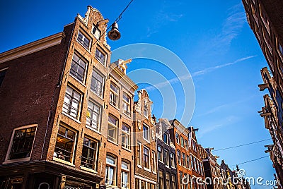 AMSTERDAM, NETHERLANDS - AUGUST 15, 2016: Famous buildings of Amsterdam city centre close-up. General landscape city view Stock Photo