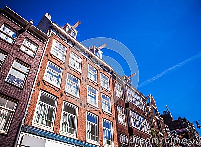 AMSTERDAM, NETHERLANDS - AUGUST 15, 2016: Famous buildings of Amsterdam city centre close-up. General landscape city view Stock Photo