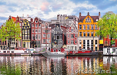 Amsterdam Netherlands dancing houses over river Amstel Stock Photo