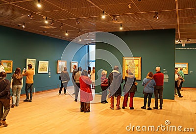 Amsterdam, Netherlands - December, 2022: Vincent Van Gogh Museum interior in Amsterdam, Netherlands with visitors Editorial Stock Photo