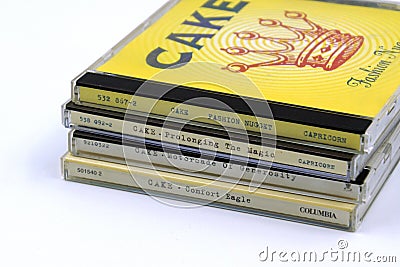 Compact Disc CD Albums from CAKE. Editorial Stock Photo