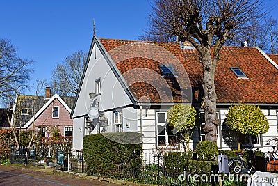 Amsterdam, Netherlands. February 2023. The wooden facades of the houses in Broek in Waterland. Editorial Stock Photo