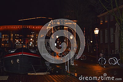 Amsterdam, Netherlands. January 2023. An illuminated drawbridge in downtown Amsterdam. Editorial Stock Photo