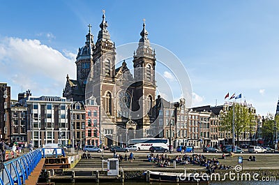 Amsterdam, Netherlands - May 8, 2015: Tourists at Church of Saint Nicholas in Amsterdam Editorial Stock Photo