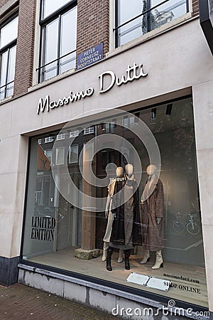 Store front of Massio Dutti, a brand of the Spanish Inditex Group, Amsterdam branch Editorial Stock Photo