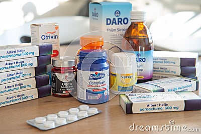Amsterdam, Netherlands, 03/21/2020. People buy supplies of medicines related to the Coronavirus CoV, COVID-19. People with flu c Editorial Stock Photo