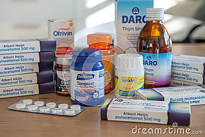 Amsterdam, Netherlands, 03/21/2020. People buy supplies of medicines related to the Coronavirus CoV, COVID-19. People with flu c Editorial Stock Photo