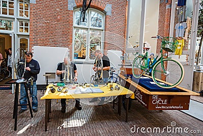 Men repair bicycles Editorial Stock Photo