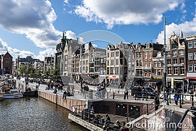 Old traditional leaning houses along the canal in Amsterdam, Netherlands Editorial Stock Photo