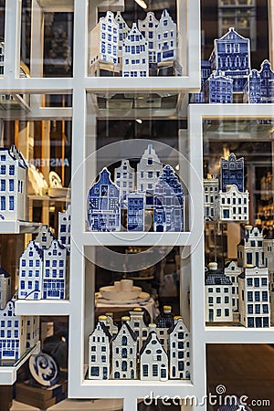 Souvenir of old traditional leaning houses in Amsterdam, Netherlands Editorial Stock Photo