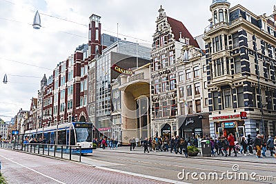 04.18.2023 Amsterdam, Netherlands. Tram station in the centre of Amsterdam. Beautiful architecture of the Netherlands. Editorial Stock Photo