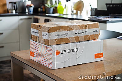 Zalando and De Bijenkorf online package delivery, unboxing package, online shopping, fashi Editorial Stock Photo