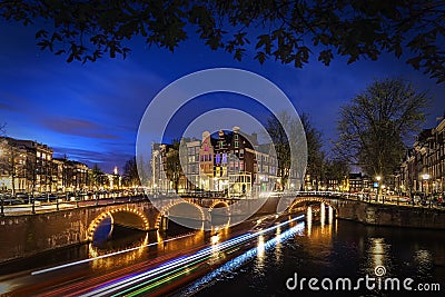 Amsterdam`s canal at night Stock Photo