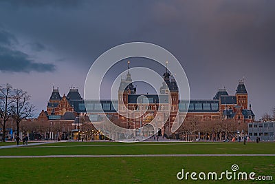 Amsterdam at summer night. Famous national Rijks museum general view at dusk Stock Photo