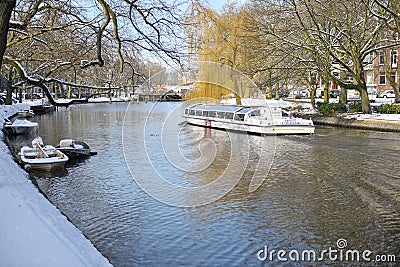 Amsterdam winter snow canal Amstel city center. Editorial Stock Photo