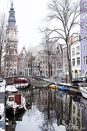 Amsterdam Zuiderkerk church tower and canal Editorial Stock Photo