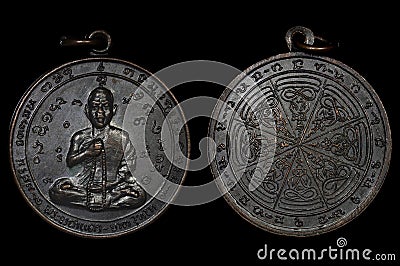 Amulet Coin Phra Ajarn Chakhamdaeng, BE 2513, The great master monk at Laos Issued at Champasak Laos. Stock Photo