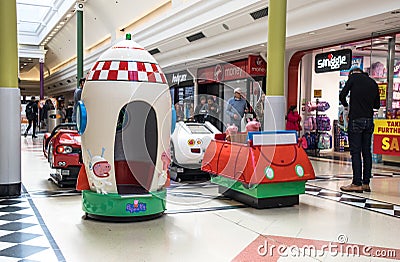 Amusement rides for children in a modern shopping centrte mall Editorial Stock Photo