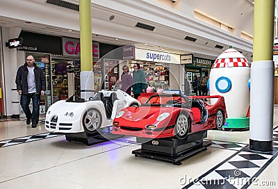 Amusement rides for children in a modern shopping centrte mall Editorial Stock Photo